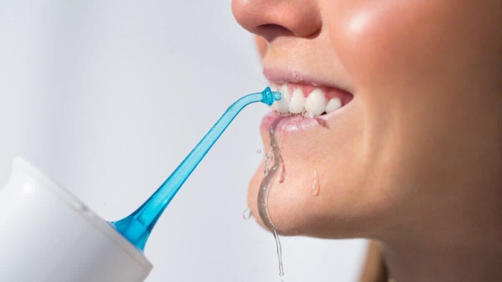 water flosser vs traditional floss